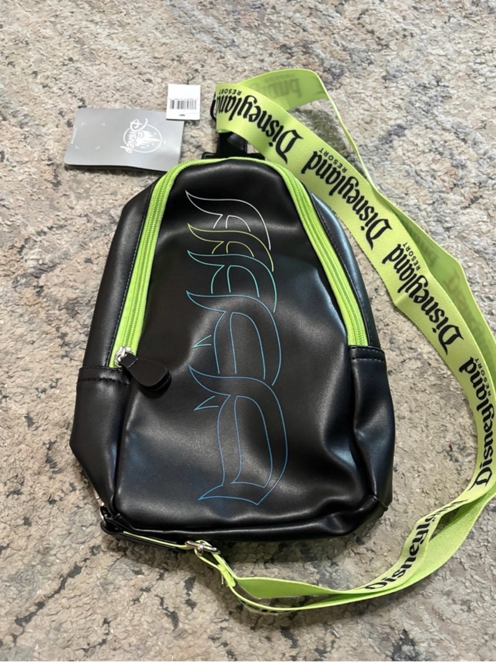 Disney Black Sling Bag with Neon Green Strap and Disneyland logo Trim